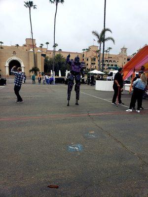 Band outside with a robot dancing