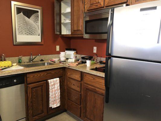 In room kitchen...no oven, but has a full sized fridge, 2 stove top burners & microwave