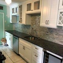 New kitchen cabinets countertop and backsplash.