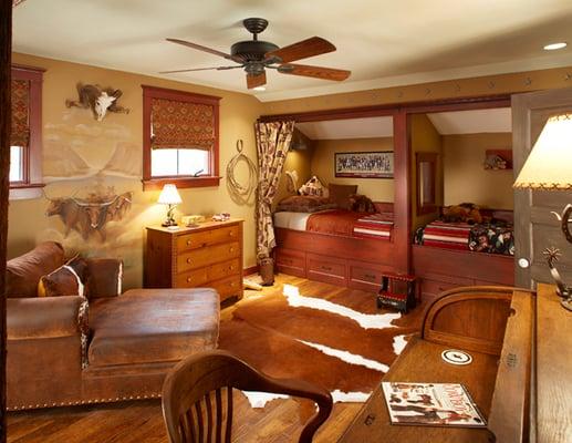 Kids western themed room with recessed beds for more floor space.