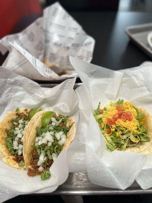 Chorizo tacos on the left. Barbacoa on the right.