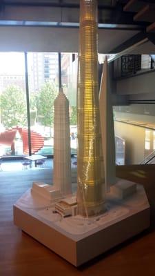 Mezzanine space with a massive model of the Shanghai tower.