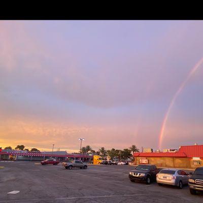 The of the restaurant and a great rainbow