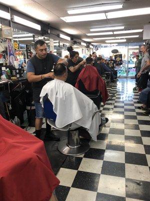 Full house blessing to the Campos Barber Shop