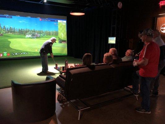 Simulator bay at Divots Golf