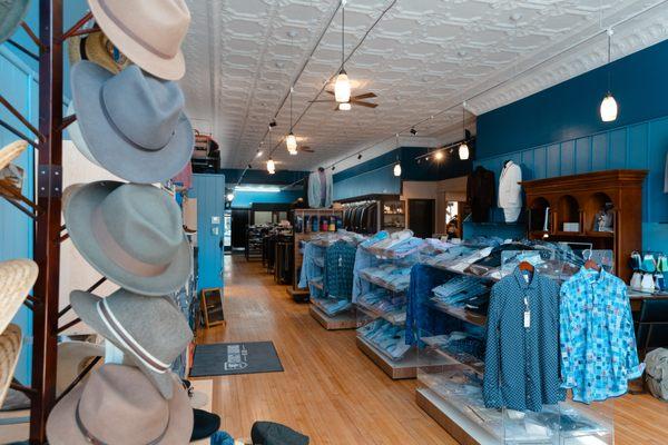 Men's hats and casual wear side of J. Robert's Menswear in Elkhorn, a locally-owned men's clothing store.