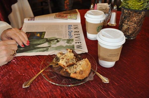 Enjoying an apple-pecan muffin and Starbuck's coffee