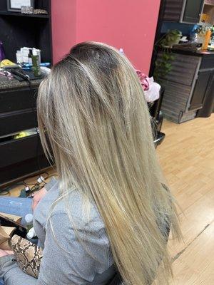 Platinum blonde with dark root