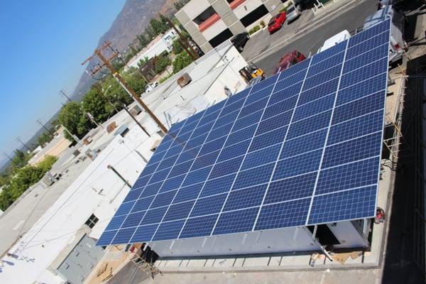 24.4kW custom canopy build in progress, over two shipping containers holding 500kWh of battery based energy storage.   imgur.com//a/YFwxJ