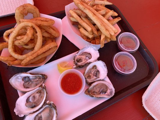 oysters on the half shell, onion rings, french fries