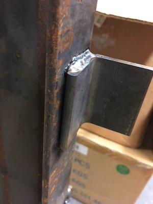 It is hard to see but there is a gap between the angle piece and the channel. This caused the top of the bracket to not be level with @ top.