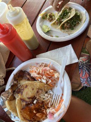 Pupusas and tacos de carnitas with a fresh lemonade.