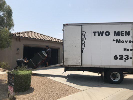 Johnny and Cody safely moving a safe