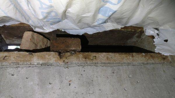 Before: crawlspace vent open to the outside-full access for rodents and other critters.