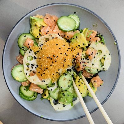 Yuzu Kosho Salmon bowl: with Avocado, Sake Braised Lotus Root, Cucumber, Cilantro, Yuzu Tobiko and Yuzu Kosho Sauce.