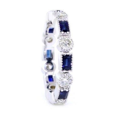 Blue sapphire and diamond anniversary band in 14k white gold. Custom designed and crafted.