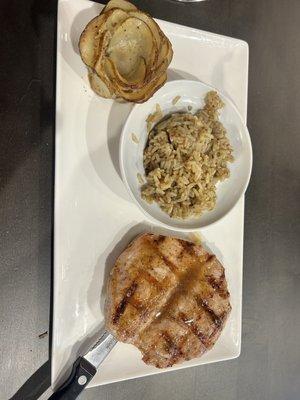 Peach glazed butterfly pork chop with potato au gratin and mushroom rice.