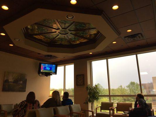 Tv and nice open decor plan in waiting room. Plenty of magazines great variety and nice window over looking the lake area.