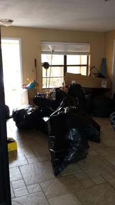 A work order was issued to Junk Genie to remove interior debris from foreclosed property.