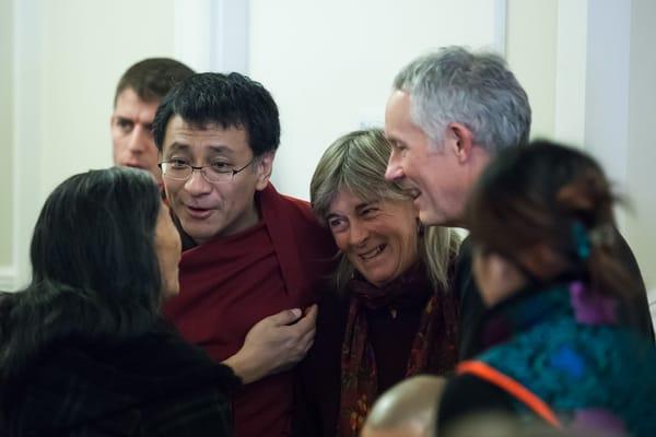 Dzogchen Ponlop Rinpoche, founder and president of Nalandabodhi, greets visitors at "Awake in Seattle" at Nalanda West.