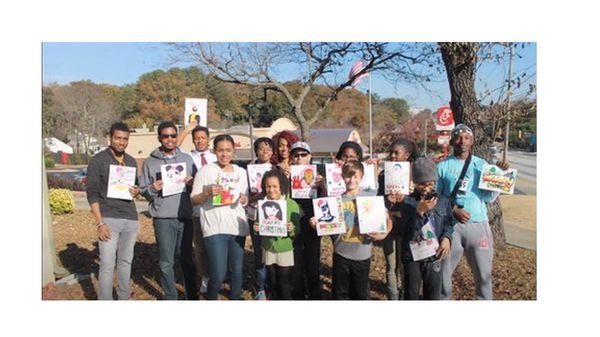 Amario's Art Academy students with holiday cards for patients at Children's Healthcare of Atlanta.