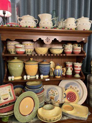 Longaberger and various other pottery pieces.