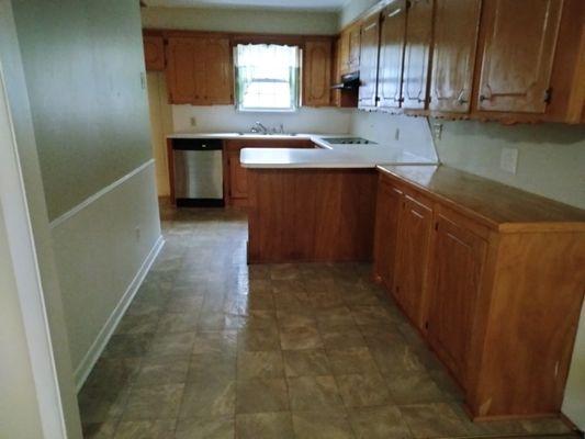 Surface cabinet floor cleaning