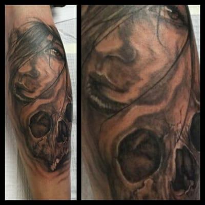 black and grey skull and portrait by Gail.