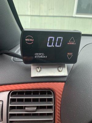 Some really slick CUSTOM boost gauge bracketing. Be happy you don't see at this everyday. Self tapping screws right into my dash!