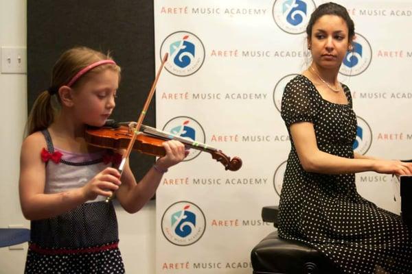 Faculty accompanies Violin Student