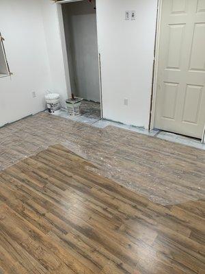 New laminate flooring being installed