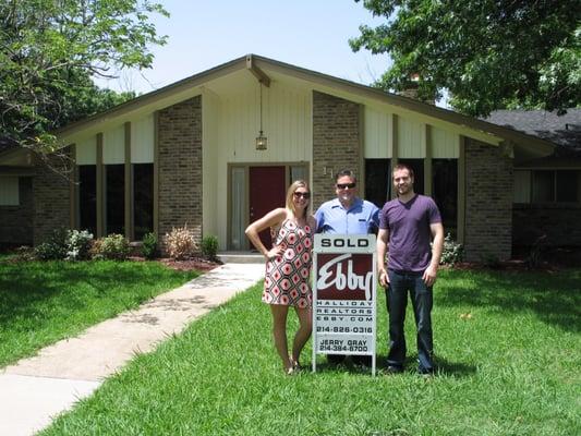 Jerry with a lovely young couple in front of their new home in Rockwall, TX.