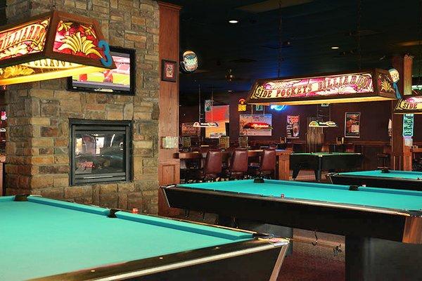 30 Pool Tables 3 Projection Screen & 22 Flat Screen TV's 2 Electronic Dartboards NFL Ticket House Pool League-Mon 8 or 9 Ball Tour-Sat