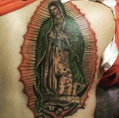 Virgin Mary by Macho