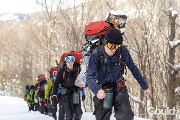 A group of Gould students hiking while on Junior Four Point