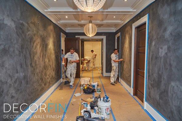 The Decorfin Team applying the second coat on this Black Marble Dust Design.