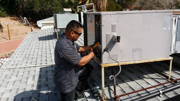 Our service technician, Jason working on a unit.