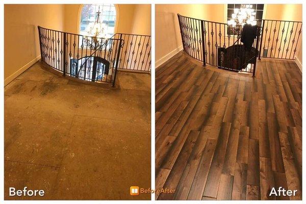 Solid hardwood install in upstairs hallway by Beluco Floors