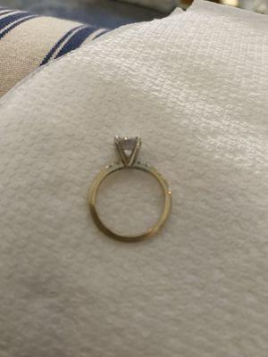 Another picture of My engagement ring after they destroyed it you can see the difference in the middle the crown of the ring b