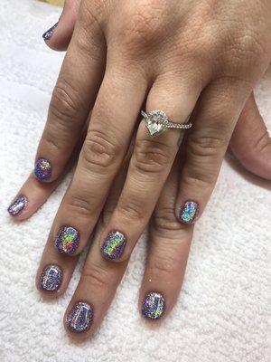 Unicorn dandruff powder on gel manicure