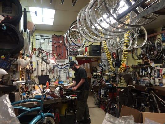 One of the guys working on my Surly Disk Trucker.