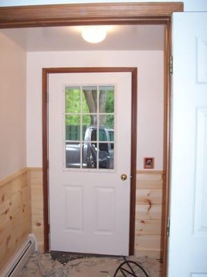 Entry way Carpentry and Painting, wood trim put up on walls