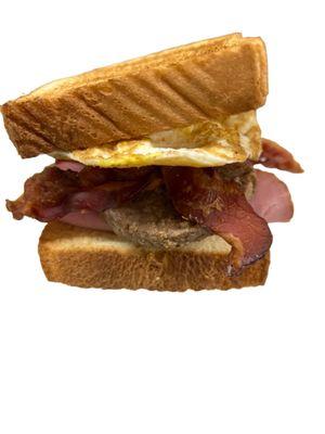 The Big Pig:   sausage, bacon, ham, egg, cheese served on Texas toast.