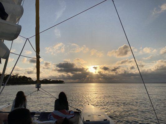 One of the most relaxing ways to experience a sunset is on the Stiletto 27 catamaran- Destin Sailing Adventures.