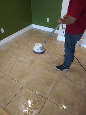 Buffing tile helps get deeply embedded stains out, and it beats using a tooth brush.