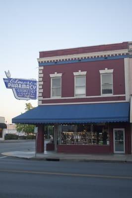 Elmore's at the corner of Walnut St & Washington St.