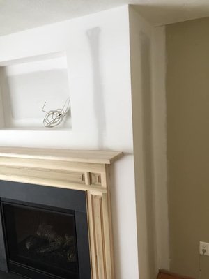 Small Fireplace needed fresh new drywall!