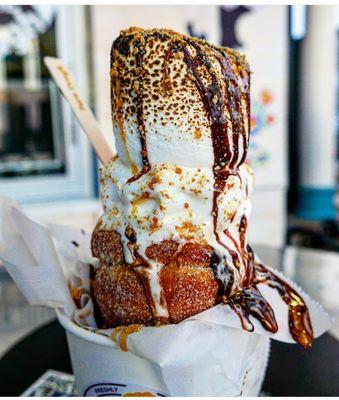 S'mores Campfirestyle Cinnamon roll  roasted Marshmallow Ice cream cone   With Chocolate Sauce Caramel