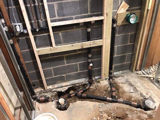 New under ground rough-in for a three piece shower.