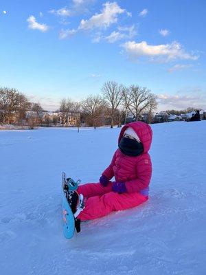 Perfect place to bring a toddler to learn to snowboard! The hill is a gentle slope down when you start midway!